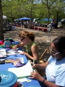 LEAP members work an information table at One Earth Day